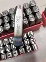 Bộ đóng chữ ngược hiệu YC